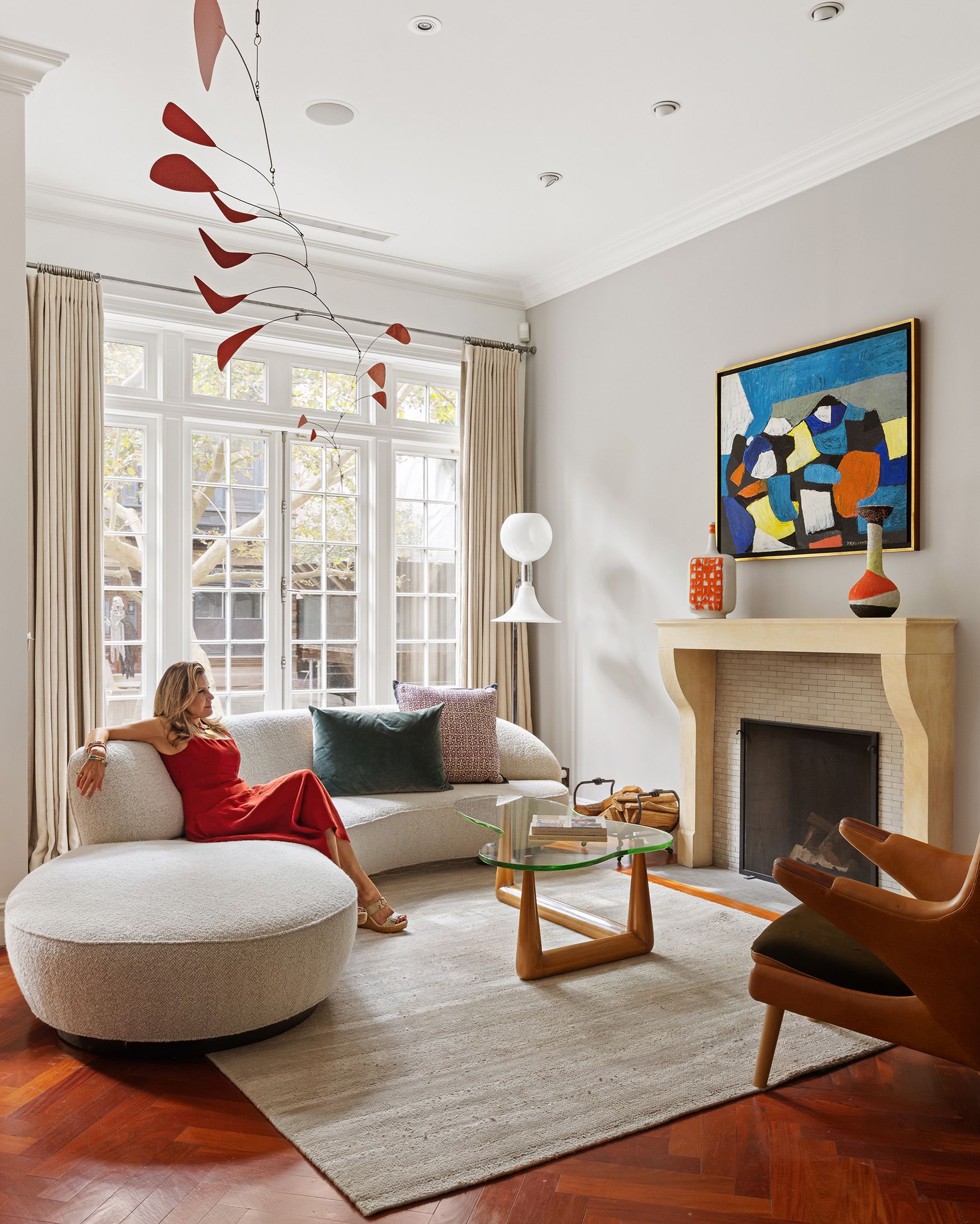 Luxury Manhattan living room with Calder mobile and fireplace