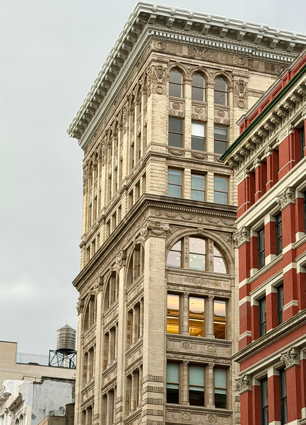 SoHo cast-iron building with a wooden water tower on its roof